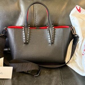 Christian Louboutin Black Leather crossbody with Red Trim and Stud Accents.